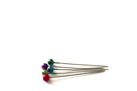 multicolored pin isolated on white backgroundの写真素材