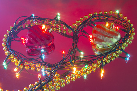 Garland in the form of heart with Christmas toysの写真素材