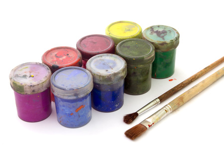 old gouache and brush for painting isolated on white backgroundの写真素材