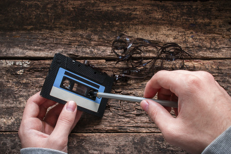 man rewind a cassette tapeの写真素材