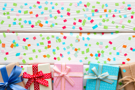 gift boxes on background of confettiの写真素材