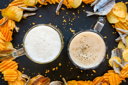 beer and frame of fish and chipsの写真素材