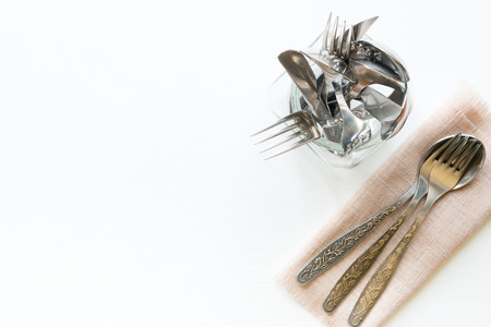 Cutlery in a jar and on a napkin