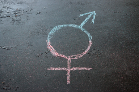 Symbol of intersexuality on a black backgroundの写真素材