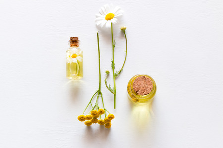natural cosmetics from field flowers on white background closeupの写真素材