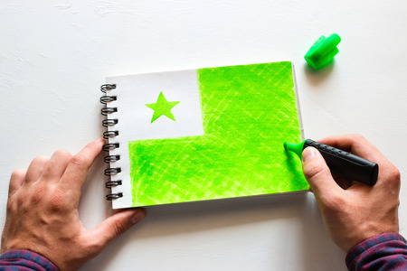 man draws the flag of Esperantoの写真素材