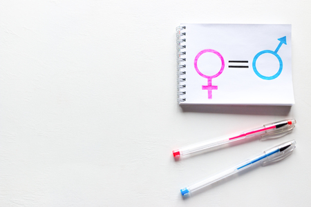 The female gender symbol is equal to the male with place for text on a white backgroundの写真素材