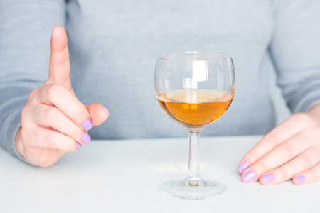 woman warns about the dangers of alcoholの写真素材