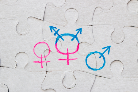 transgender symbol, female and male gender symbol drawn on the puzzle concept of equalityの写真素材