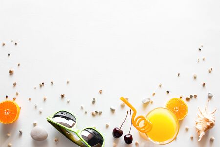 fruits, glasses, shells - accessories for a beach holidayの写真素材