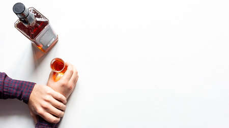 holding his hand not to drink alcohol concept fight against alcoholism, addiction on a white...