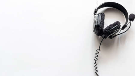 headphones with microphone on white background with place for text concept remote work, operator, tech supportの写真素材
