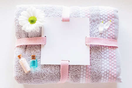 spa towel with place for text and natural home made cosmetics close upの写真素材