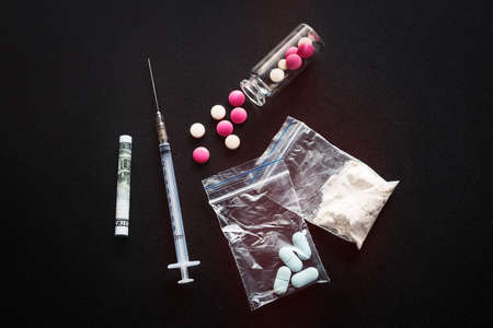 hard drugs, syringe on dark backgroundの写真素材