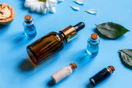 samples of cosmetics on a blue background from natural ingredients