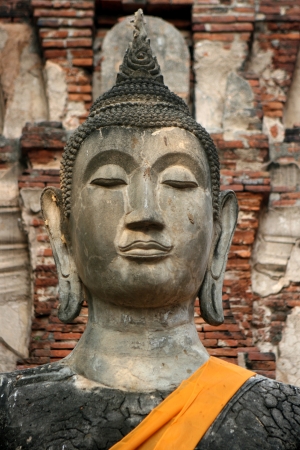 Massive Buddha statue at Sukhothai Thailandの写真素材