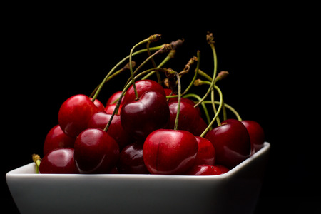 Cherries Bowl on dark backgroundの写真素材