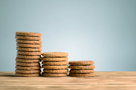 Stack of cookies on vintage wooden background