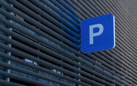 Parking sign on the background of a modern office building. 3d renderingの写真素材