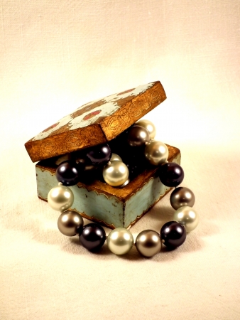 black and white pearls in an old box necklaceの写真素材