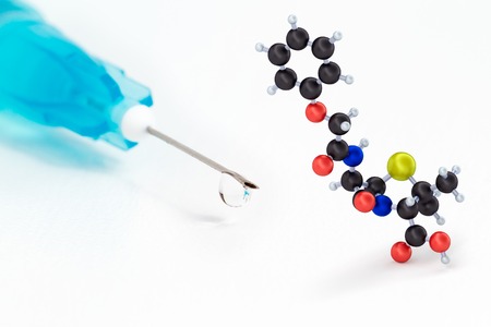 Syringe and Penicillin V compositeの写真素材