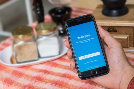 CHIANG MAI, THAILAND - JUNE 07,2015: A man holds Apple iPhone 6s with Instagram application on the screen. Instagram is a photo-sharing app for smartphones.のeditorial素材