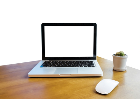 The computer is on the work table isolated white background, with clipping path.の写真素材