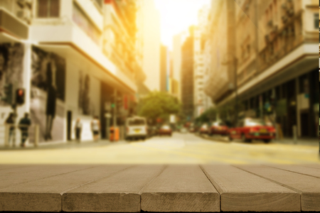 city and wooden desk space.の写真素材