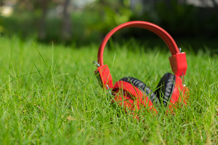 Headphones on grass, selective focus.の写真素材