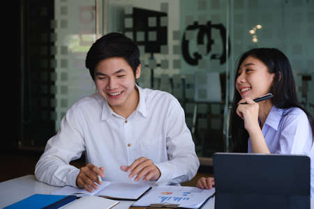 Fund managers team consultation and discuss about analysis Investment stock market by digital tablet.の写真素材