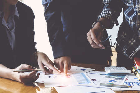 Teamwork of partners integration concept. Group of Business in smart casual wear discussing in the...