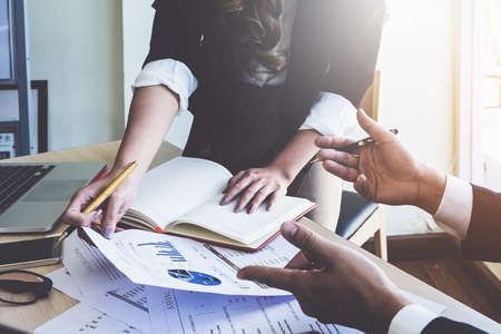 Fund managers team consultation and discuss about analysis Investment stock market. vintage concept.の写真素材