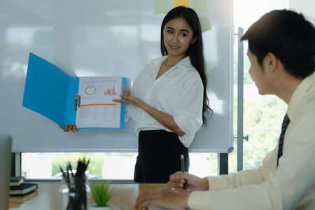 Group of Businessman and Accountant checking data document on digital tablet for investigation of corruption account . Anti Bribery concept.の写真素材