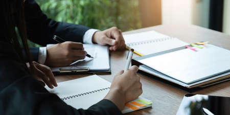 Fund managers researching and analysis Investment stock market. Business team consultation and...