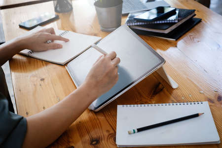 User experience concept. Creative Web Designer sketching application and developing template layout...