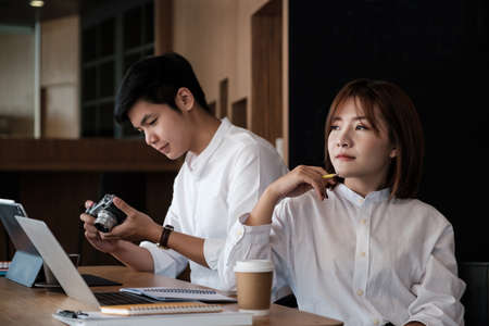 Blogger or Vlogger checking the content before uploading on website. Freelance and modern people...