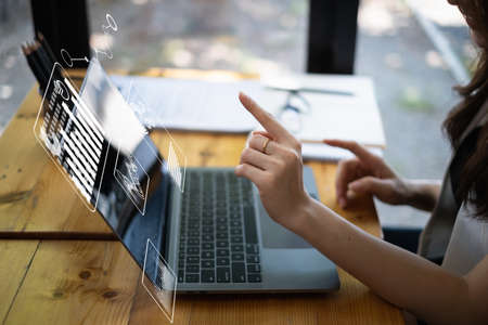 Fund managers researching and analysis Investment stock market by paperwork document with virtual...