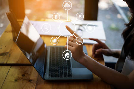 Fund managers researching and analysis Investment stock market by paperwork document with virtual financial on screen . business finance fintech concept.の写真素材