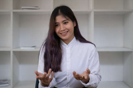 Employer reviewing good cv of prepared skilled applicant. HR manager making hiring decision. Interview concept.の写真素材