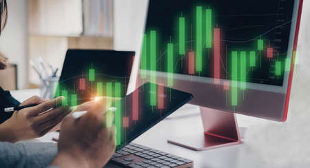 Business team working together analyze technical price graph and indicator. Chart and stock trading...