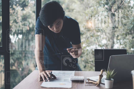 Businessman analyzing a business analytic and intelligenceの写真素材