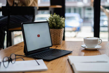 Chiang mai, Thailand - SEP 09, 2021 : Tablet to connect to YouTube Premium. YouTube is a video-sharing website by googleのeditorial素材