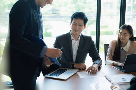 Team leaders of business showing marketing and investment plan for next years.の写真素材