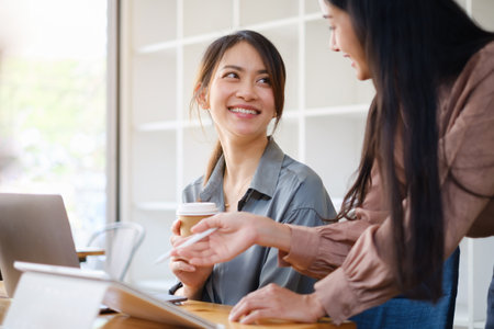 Group of Businesswoman and Accountant checking data document on paperwork for investigation of corruption account. Anti Bribery concept.の写真素材