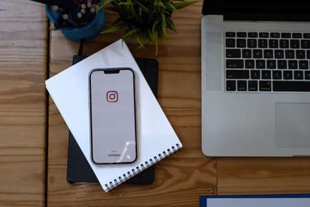 CHIANG MAI, THAILAND - DEC 03, 2021: iPhone 13 Pro Max with logo of instagram from meta. Instagram reels for making short videos and story.のeditorial素材