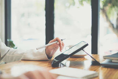 Fund managers or consultant working with digital tablet to analysis Investment stock market. finance concept.の写真素材