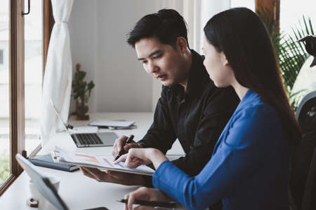 Business start up with team happy with the reward giving for her business success achievement. Achievement and Business Goal Success Concept.の写真素材