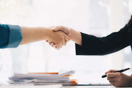 Business partnership meeting concept. Image business women handshake. Successful business people...