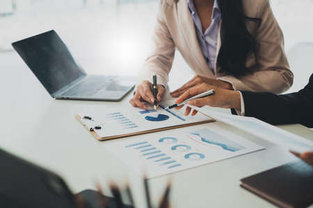Business team hands at working with financial plan, meeting, discussion, brainstrom with tablet on office desk, Meeting concept.の写真素材