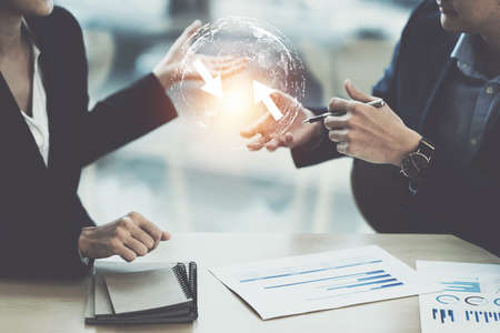 Group of IT consultant working by digital tablet and management big data and analyze financial document of company.の写真素材